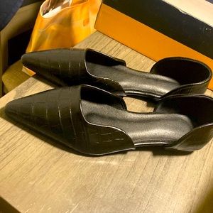 Black croc skin flats